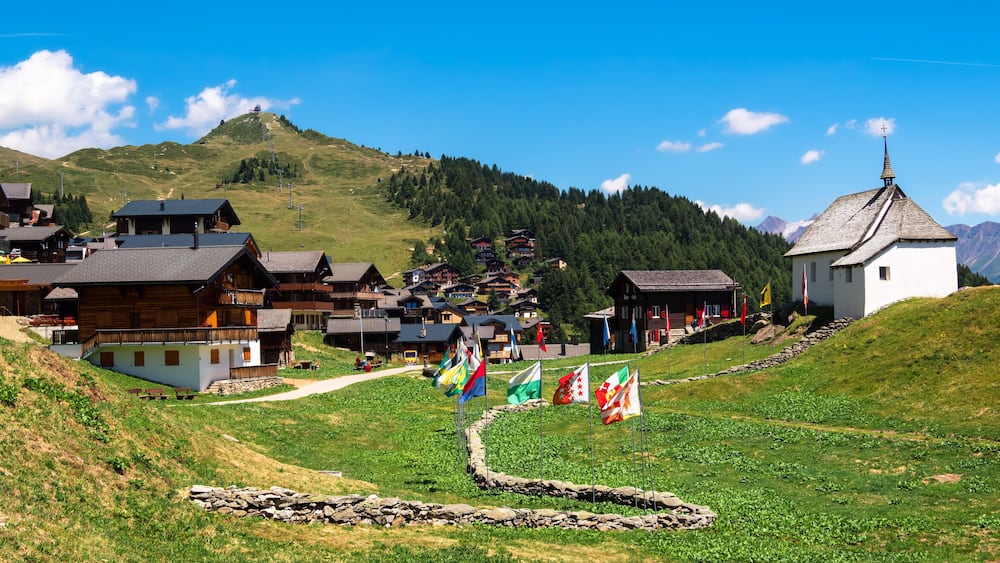 Bettmeralp, Switzerland - July 16, 2022: Idyllic tourist resort of Bettmeralp is located in the Bernese Alps on the northern slope above the Rhone Valley in Upper Valais in Switzerland