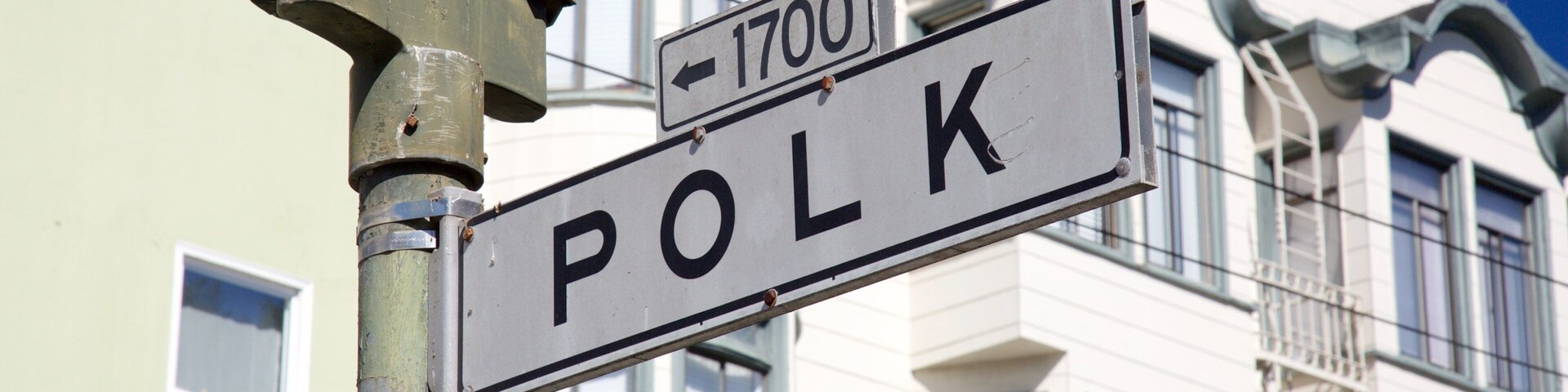 Polk Gulch showing a house and signage
