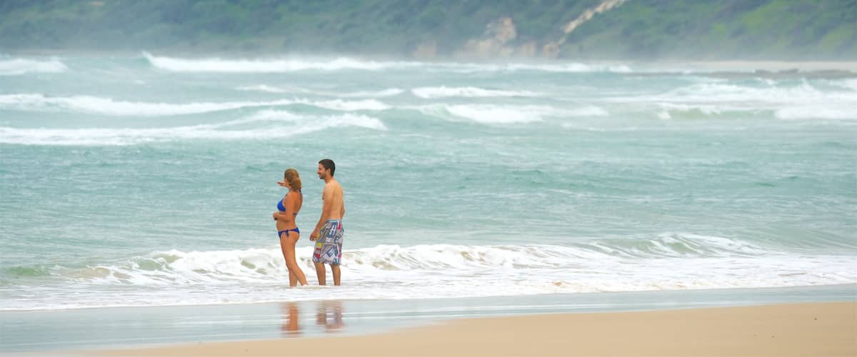 Pippi Beach showing a sandy beach as well as a couple