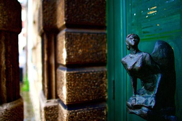 Piazza del Duomo featuring a statue or sculpture