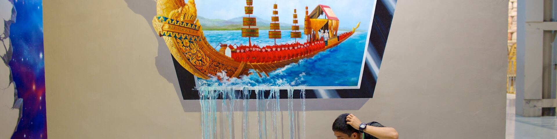 Art in Paradise featuring art as well as an individual male