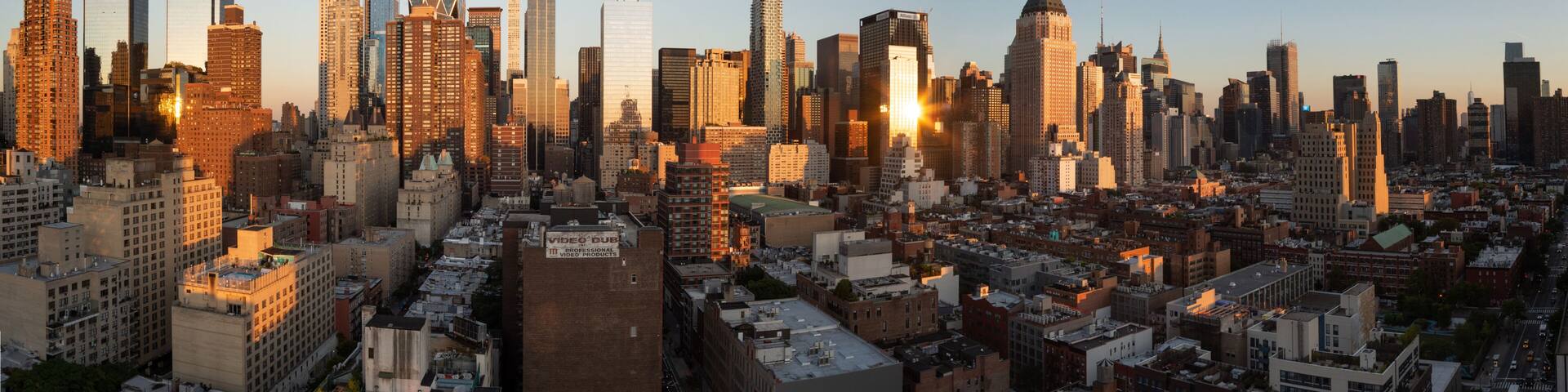 Sunset panorama of Manhattan's Hell's Kitchen skyline as seen from the 10th Avenue, Midtown Manhattan, New York City. Taken on September the 25th, 2019.