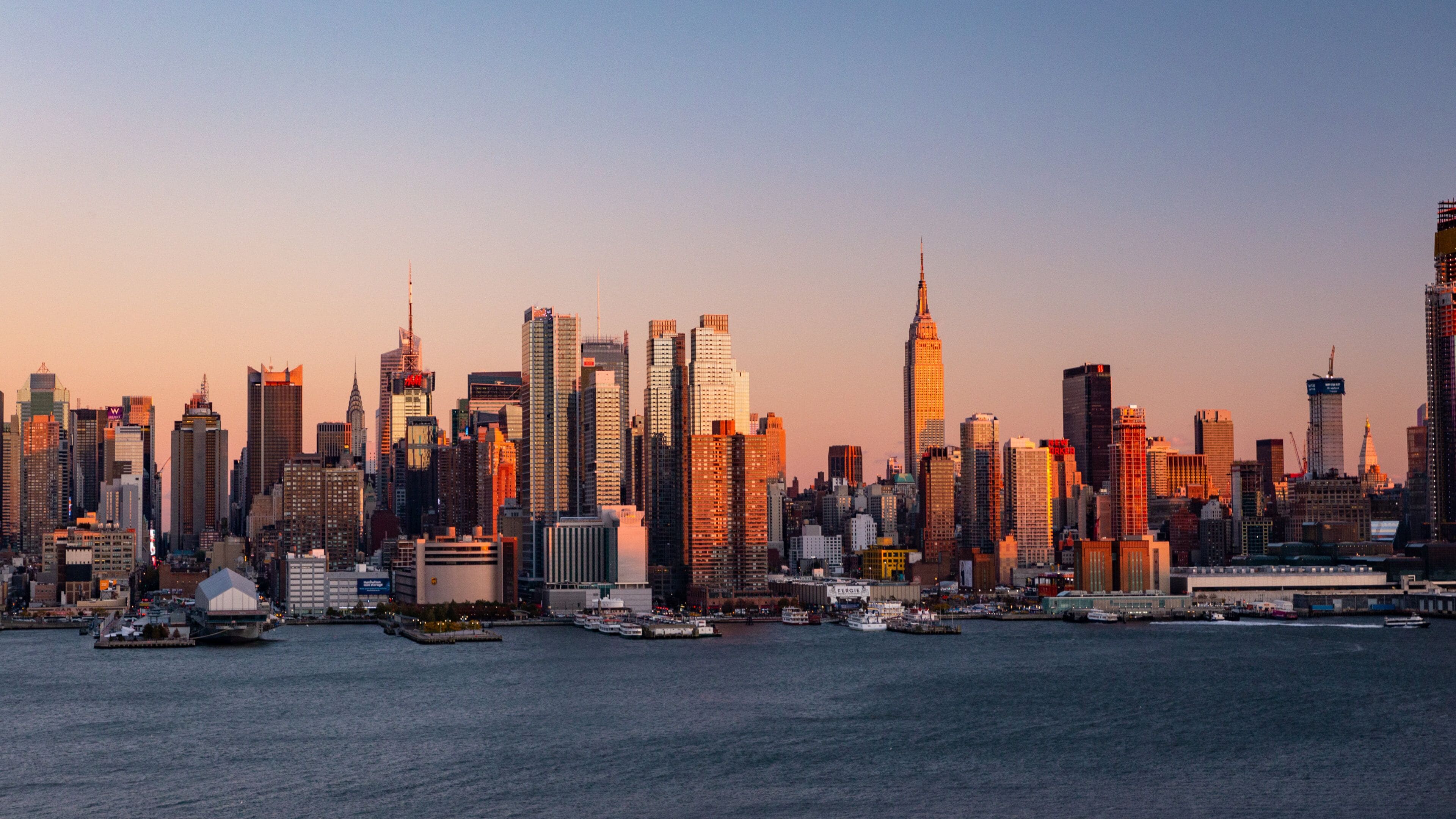 Midtown featuring a bay or harbor, landscape views and a sunset