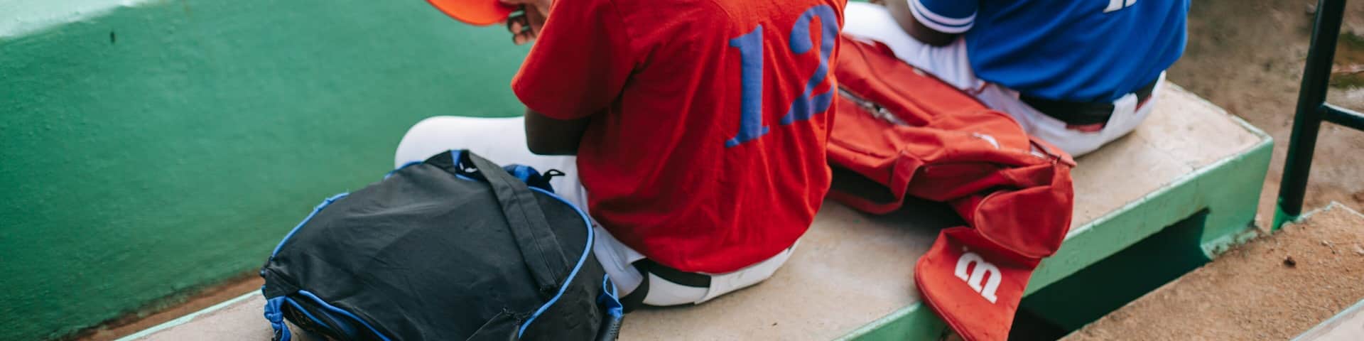 La Romana showing a sporting event as well as a small group of people