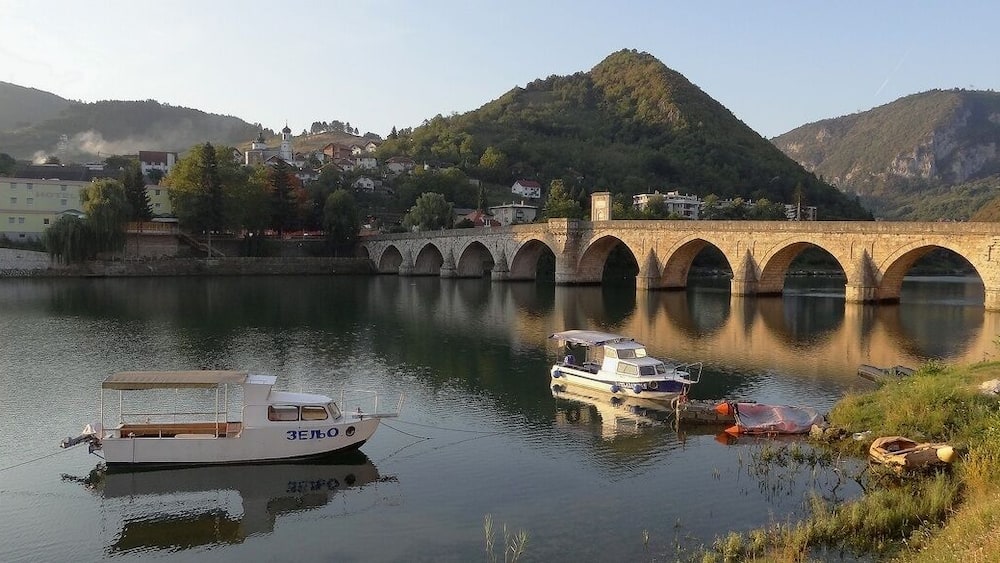 The 11-arch bridge on the Drina river entered Unesco World Heritage List in 2007 . Dates back to the 1570's... today only pedestrians can cross it and is free to visit. . Visegrad , eastern BiH .