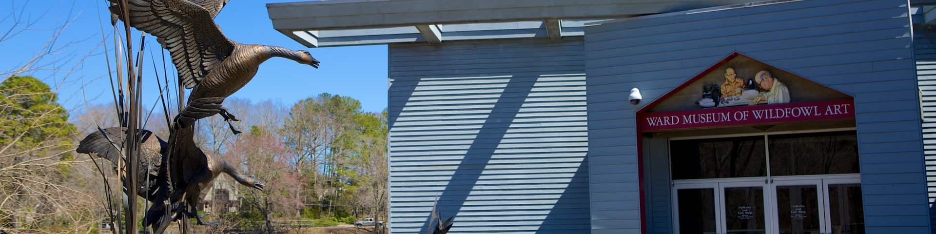 Ward Museum of Wildfowl Art featuring a statue or sculpture and signage