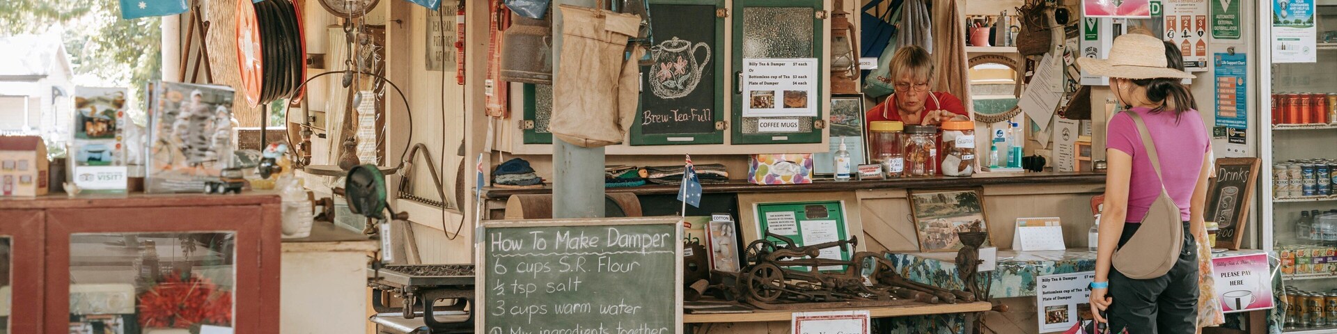 Highfields Pioneer Village showing shopping as well as a couple