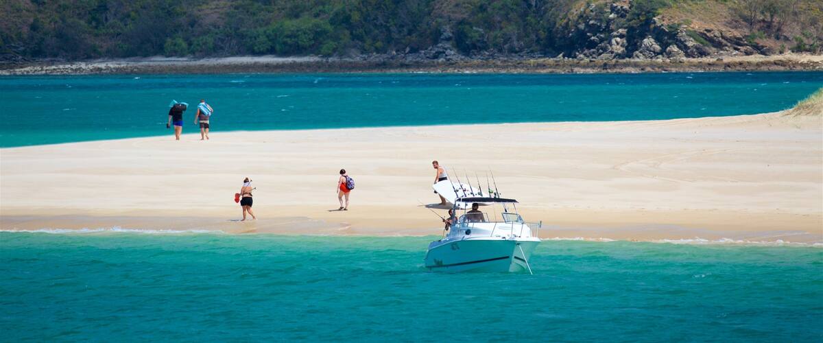 Great Keppel Beach showing boating, general coastal views and a beach