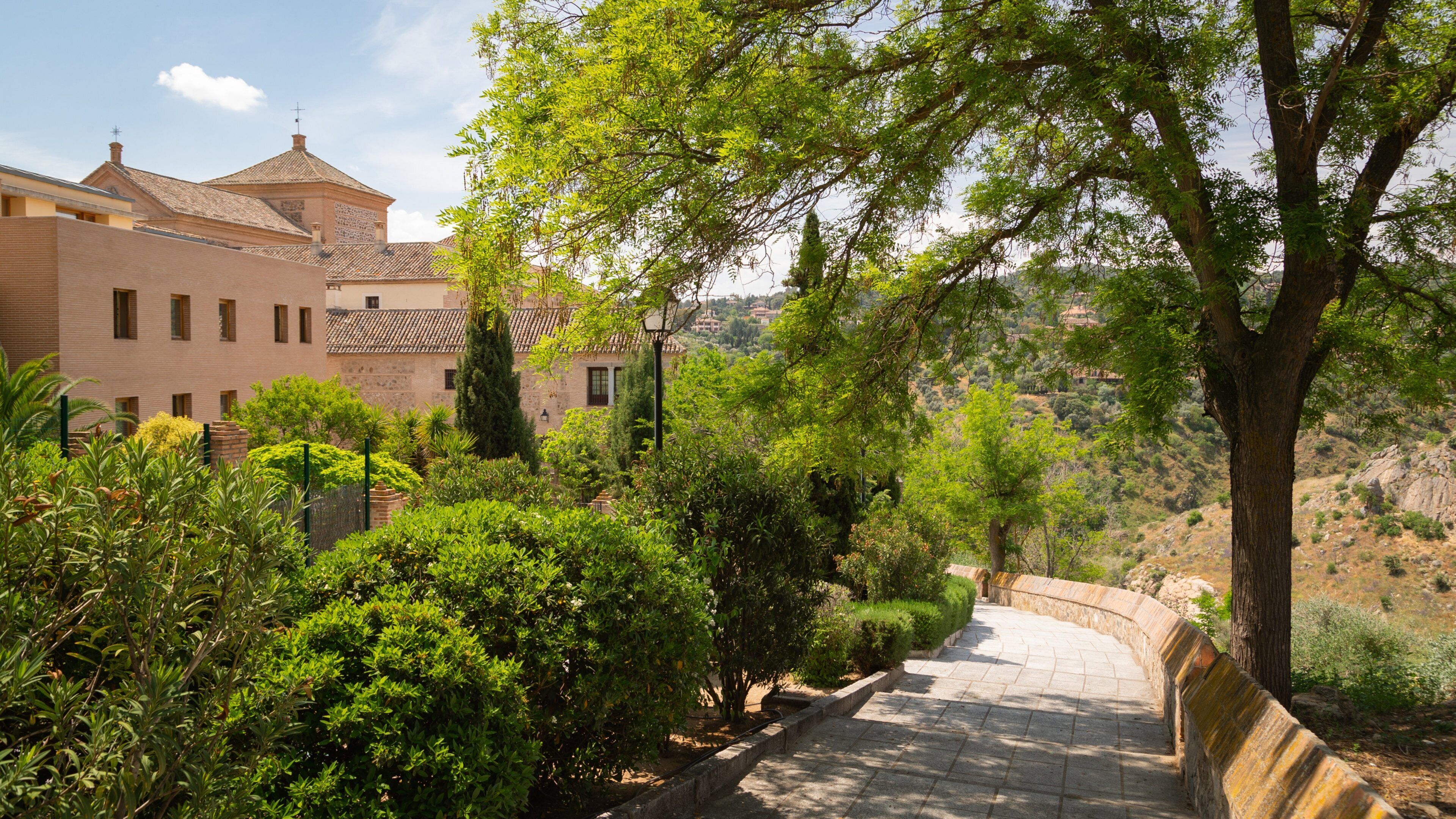 Cortes de Castilla-La Mancha Building featuring a garden