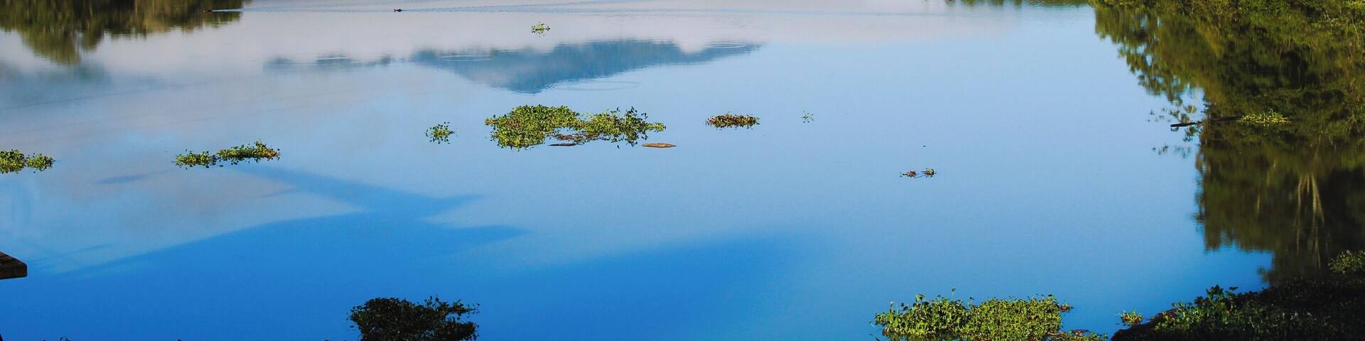 It was really early in the morning and the clouds still were touching the mountains, beautiful lake it was a peaceful experience