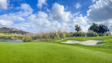 Moorpark, California, USA – December 7, 2021: Tierra Rejada Golf Club with Green Fairway and Blue Sky Cloud