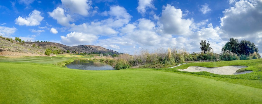 Moorpark, California, USA – December 7, 2021: Tierra Rejada Golf Club with Green Fairway and Blue Sky Cloud