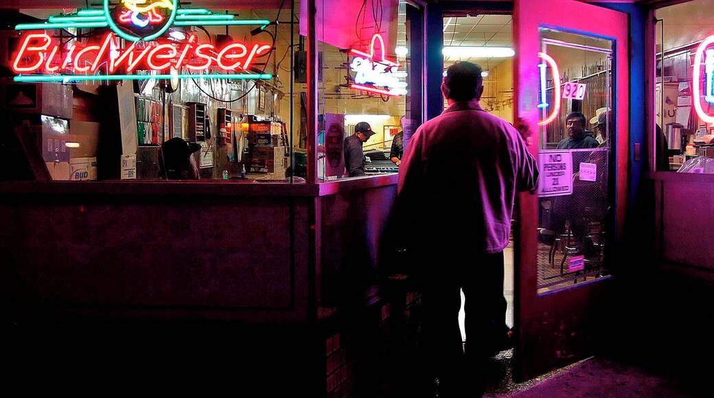 Guadalupe, CA. -March 2016: Field hands
Field workers entertain themselves on a Saturday night at the local Pool Hall, one of the only places available to them in this small farming community of Guadalupe on the central coast of California.
(Photo by Robb/Robb Image)