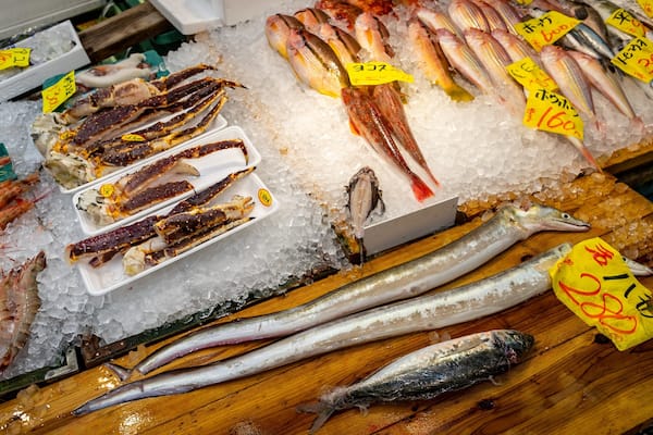 Kuromon Ichiba Market showing signage, markets and food