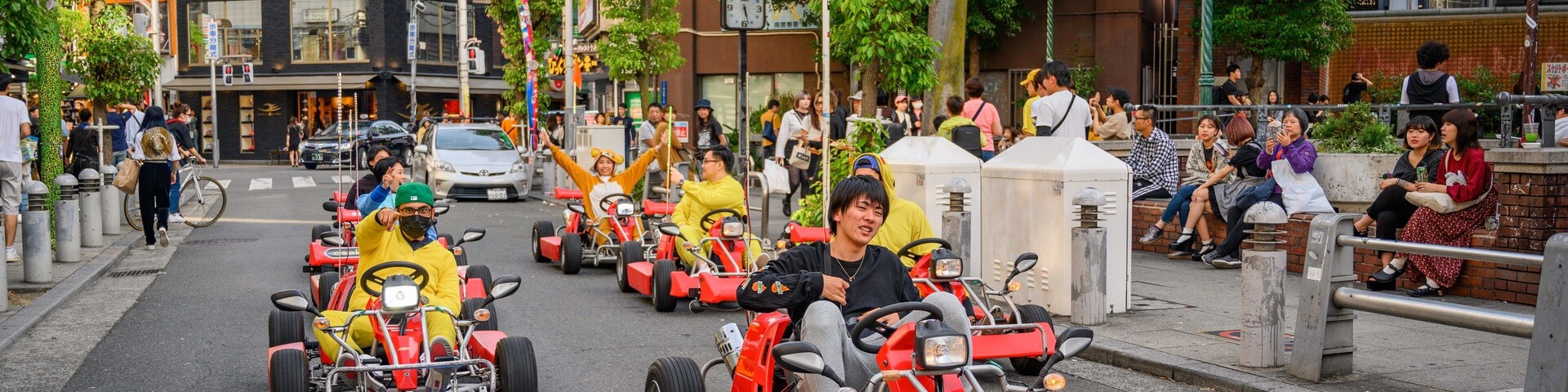 Amerika-Mura Triangle Park featuring street scenes as well as a small group of people