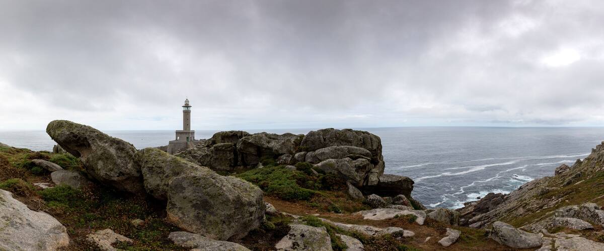 A rocky coastline with a lighthouse.