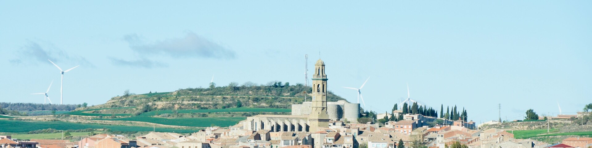 View of a village with the parish church of Sant Jaume de Calaf in the background. Villages of Catalonia. Village located in the region of Noya, Alta Segarra.