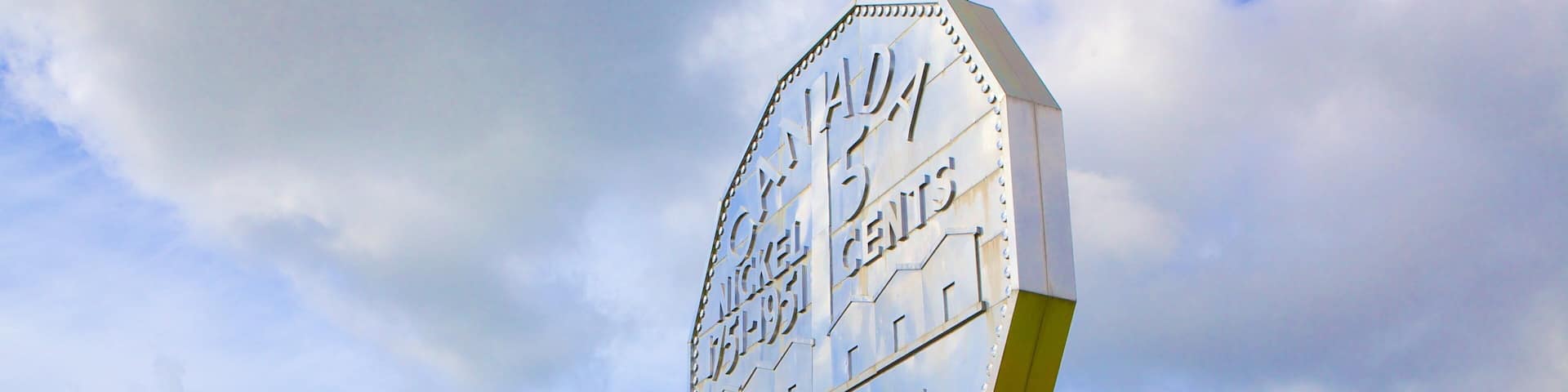 Dynamic Earth featuring signage and outdoor art