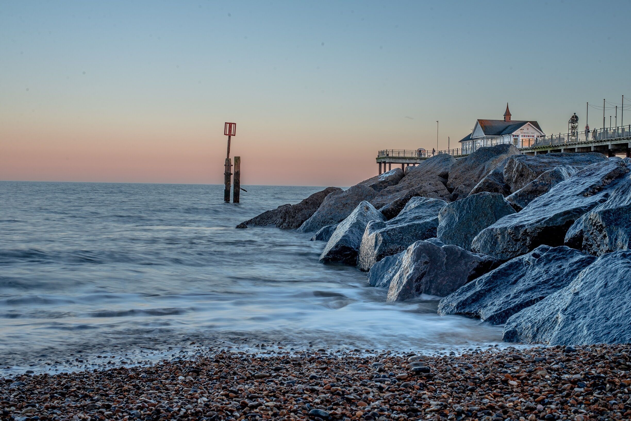 Southwold is described as the jewel of Suffolk's Heritage Coast, and it does not disappoint. 
With its famous pier, lighthouse and beach huts, Southwold is certainly one of the most popular resorts in East Anglia. 
Granted a Royal Charter back in 1489 by Henry VII, Southwold has a fascinating history and many links with the past can still be seen all over the town. 
The centre piece is the magnificent church, with its 100 foot tower and dedicated to the last king of East Anglia, St Edmund. Nearby, the lighthouse, also 100 feet tall, has given safe passage to sailors and fishermen since 1890.
The pier and its history are closely connected to that of Southwold. Its original use was, of course, practical – it was a landing stage for the steamships which arrived from London Bridge.

#uk #britain #suffolk #england #coast #sea #pier #coastal #seaside #sunset
