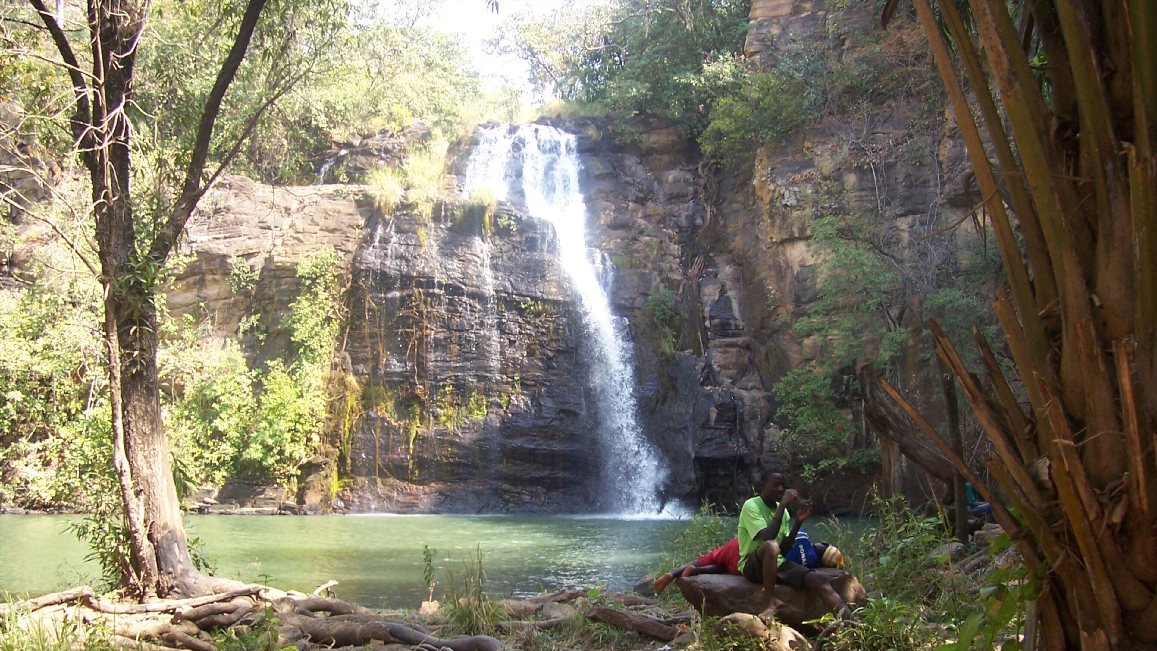 Abomey featuring a waterfall
