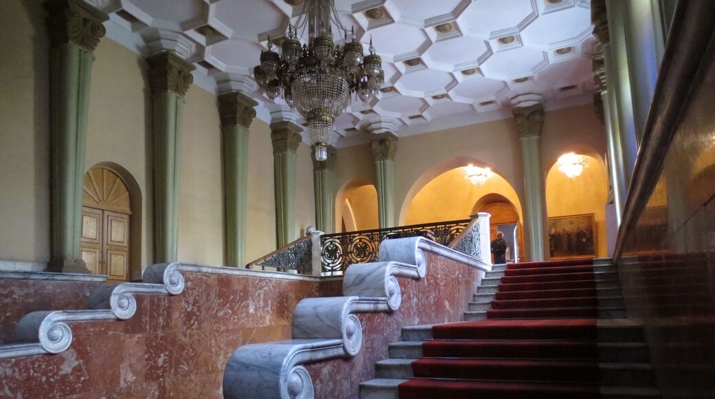 View of a staircase inside of the Stalin Museum in Gori, Georgia.
Gori is a relatively small town located about 80 kilometers from Tbilisi.
Joseph Stalin (his last name is a play on the Russian word for "steel" - his real last name was the Georgian surname of Jugashvili) was born and raised in Gori, and this museum houses both the small boarding house he was born in, and his train car.
It's certainly worth a visit if you're in Georgia. Price is 10 GEL for a ticket - and they have english speaking tour guides available.
I'll let you make up your own mind about the politics of the place, but I will say that the tour had some laugh out loud understatements like: "Stalin and the Soviet mades some mistakes, such as the forced collectivization of agriculture in Ukraine."
I would bet Germans would probably be the most interested - if you've ever been to Germany you'd understand what I mean.