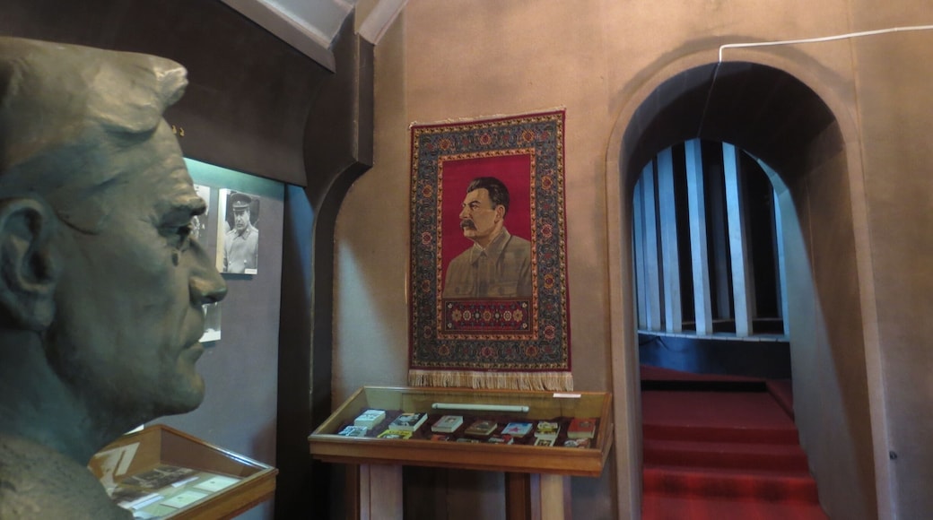 Bust of FDR on the left, image of Stalin woven into a ceremonial rug in the background.
View from the Joseph Stalin Museum in Gori, Georgia.