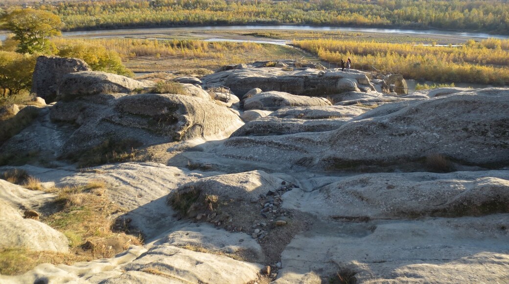 Sunshine on the rocks - view from the Uplistsikhe cave complex near Gori, Georgia.
Uplistsikhe is an ancient fortress settlement that sits up on a hill in a river valley. For a small fee you can climb up a set of stairs and explore what's left on this ancient settlement.
It features an excellent view of the surrounding area.