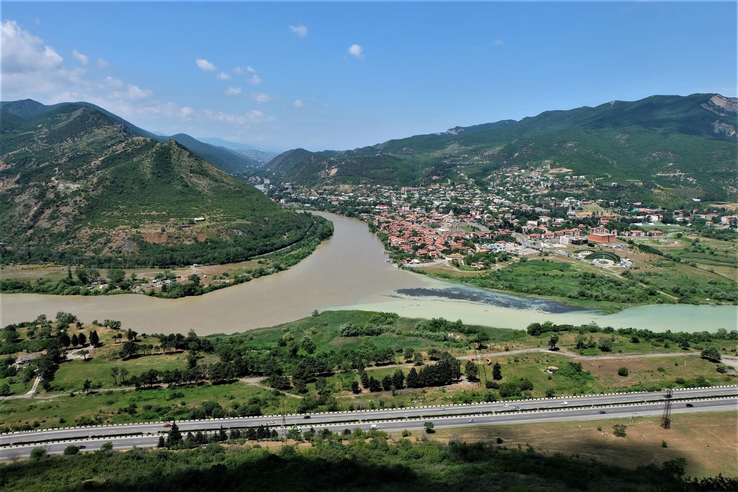 Mtskheta used to be first georgian capital. However because of landscape formation city couldn't keep growing. Also city always had ( and still do) important, religious meaning for georgian people so they decided to move capital to Tbilisi, thanks to that in case of attack by "non-believers" Mtsheta wasn't in center of attention. #aboveitall