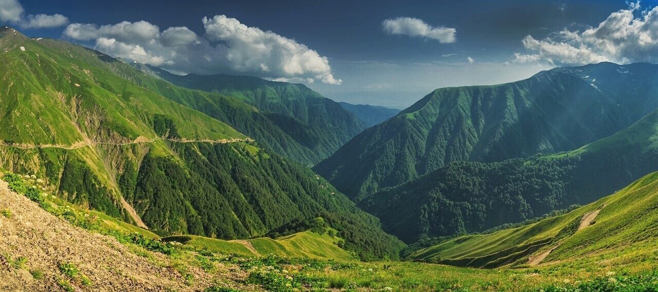 July 2010 
Near Abano Pass, Kakheti region, Georgia

View southeast of the road from Kvemo Alvani village in Kakheti region to Omalo in Tusheti region. This is the first range of Caucasus from south. The road is mere 50 km, but it takes 5 hours with 4WD Lada Niva or UAZ jeep to ascend and descend the Abano pass in altitude 2.950 meters. The road goes up along the river in the forrests and finally through green meadows to Abano pass, crossing dozens of water streams on the way and offering breathtaking sceneries to the valley behind all the time... 2.600 meters up, 1.300 meters down to Omalo in Tusheti. 