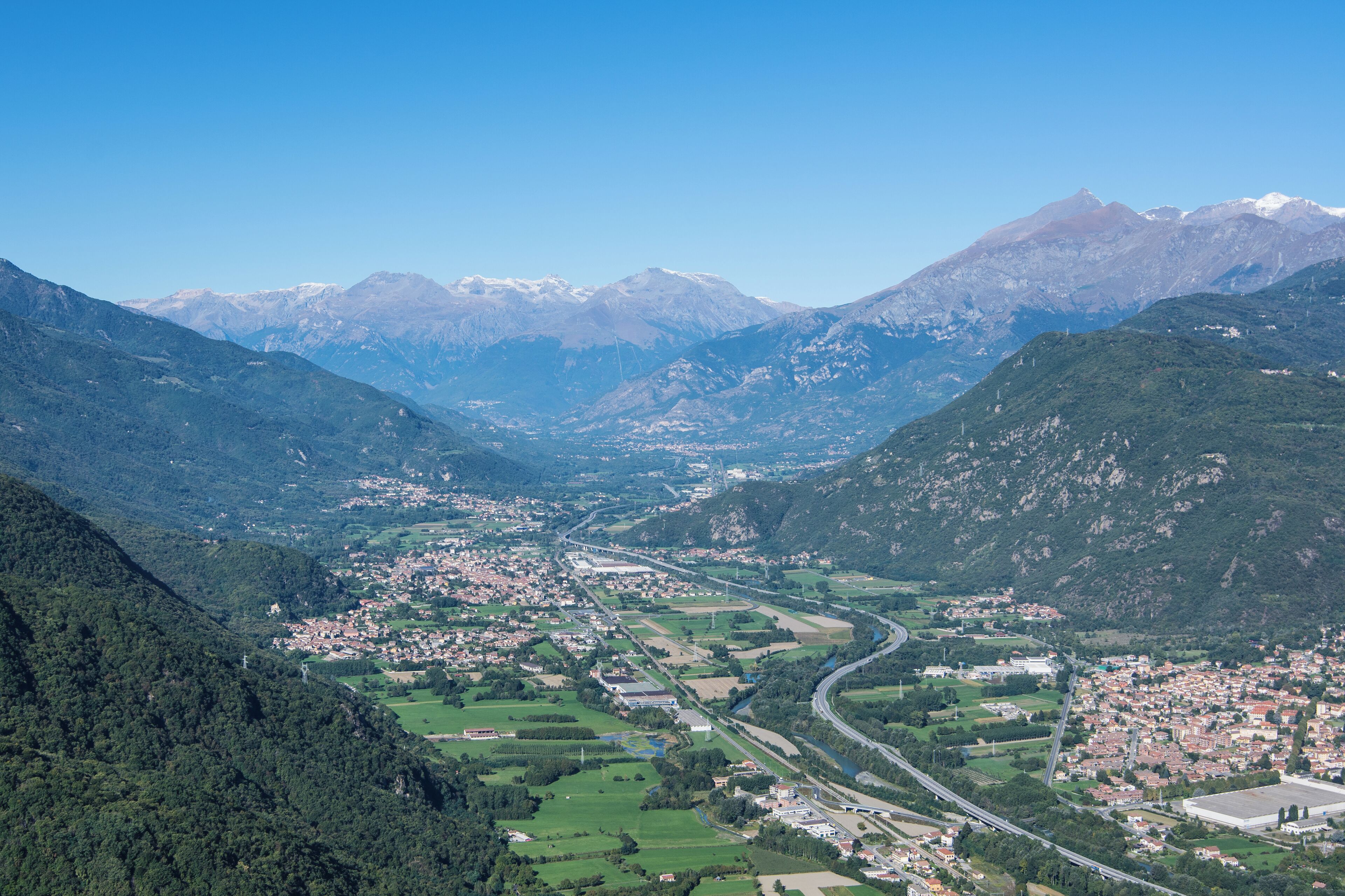 The mountain Rocciamelone (3538 m) dominates the Susa Valley (province of Turin) through which the Autostrada del Frejus leads to the tunnel of Frejus. The river Dora Riparia flows thtrough this valley. On the slope of Mont Giusalet (3312 m) the penstock of the hydroelectric powerplant of Venaus is visible.