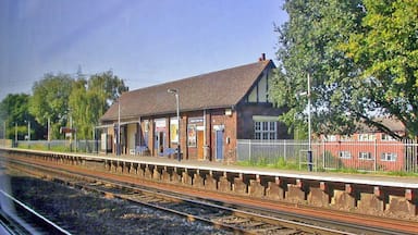 Byfleet & New Haw station, Up Slow line platform. View westward, taken from a Down train, towards Woking and the West: ex-LSWR Waterloo - Woking and the West main line. Station was 'West Weybridge' until 12/6/61.
