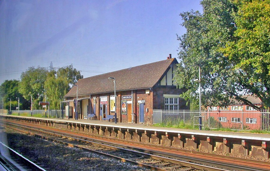 Byfleet & New Haw station, Up Slow line platform. View westward, taken from a Down train, towards Woking and the West: ex-LSWR Waterloo - Woking and the West main line. Station was 'West Weybridge' until 12/6/61.