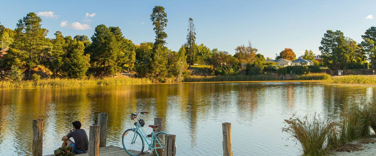 Lake Sambell featuring a lake or waterhole as well as an individual male