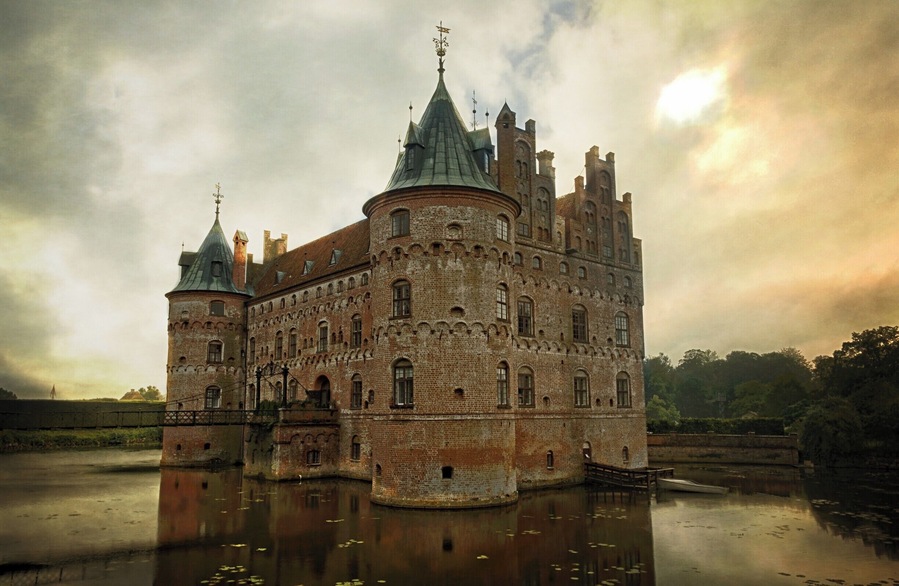 Quintessentially a fairytale castle of the best kind Egeskov Castle has much to offer. Be prepared to spend the best part of the day here as there is so much to see with it's majestic gardens that seem to go on forever.
Museums displaying vintage cars and motorcycles, aircraft and of course the Castle itself with an excellent toy museum in the attic which will appeal to every child at heart.
We paid off season prices at DKK180 each and would consider it value for money.
Want more info: http://www.egeskov.dk/