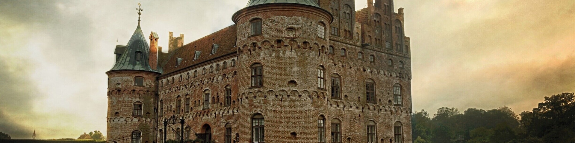 Quintessentially a fairytale castle of the best kind Egeskov Castle has much to offer. Be prepared to spend the best part of the day here as there is so much to see with it's majestic gardens that seem to go on forever.
Museums displaying vintage cars and motorcycles, aircraft and of course the Castle itself with an excellent toy museum in the attic which will appeal to every child at heart.
We paid off season prices at DKK180 each and would consider it value for money.
Want more info: http://www.egeskov.dk/