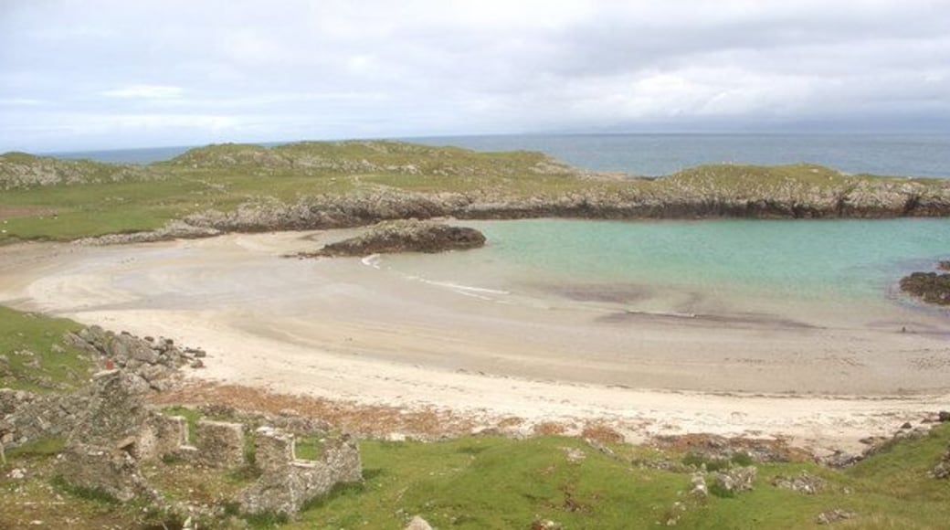 Sorisdale Bay, Coll The bay at the end of the road in the north east of Coll, viewed from high ground to the south west of it. Also seen is one of a number of ruined buildings in the area surrounding the bay.