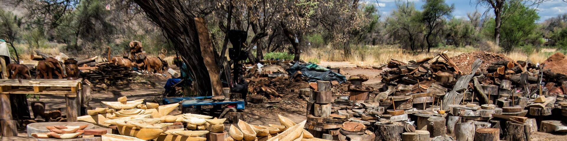 Wooden boats and other items at local wood craft market in Namibia, Southern Africa