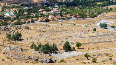 Panoramic view to the remains of big temple of Hattusa and Bogazkale village. Turkey (Turkiye)
