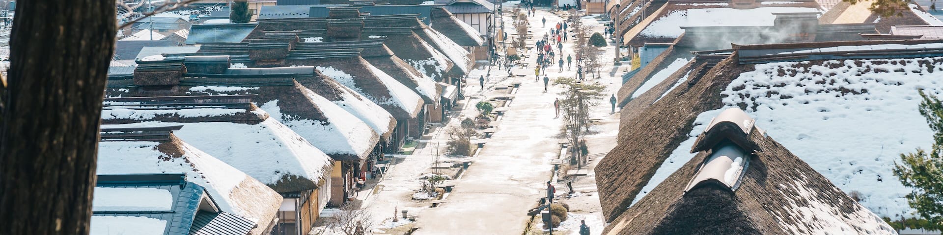 Ouchi Juku ancient farmer house village with snow in winter, former post town along the Aizu-Nishi Kaido trade route during the Edo Period. Shimogo town, Minamiaizu, Fukushima Prefecture, Japan
