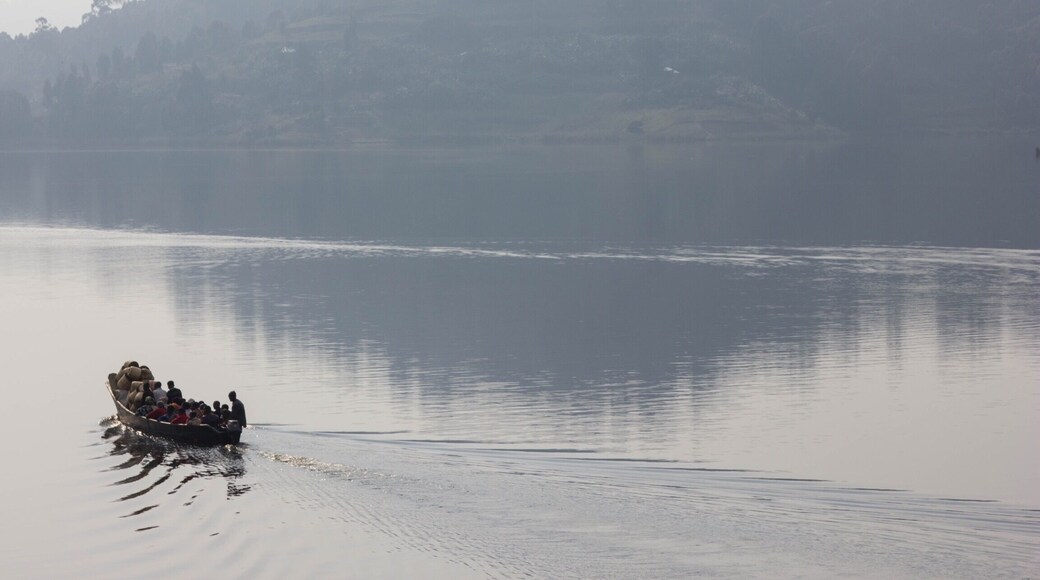 Canoeing over a beautiful lake in Uganda to reach our next destination!