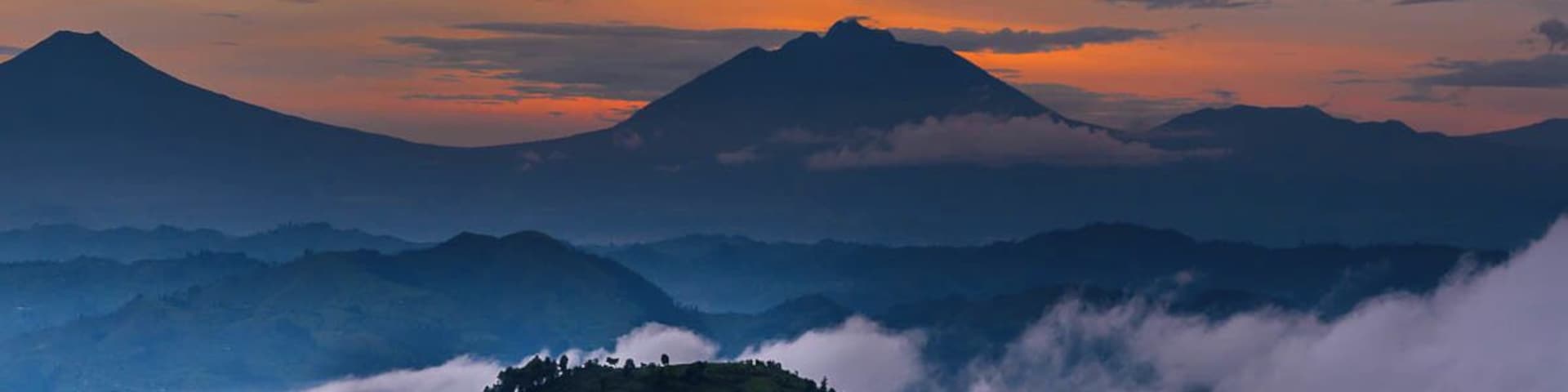 #Goldenhour view of the Virungas. In the distance is Nyaragongo Volcano, but I was safely in Uganda when I took the photo. #Gorillas