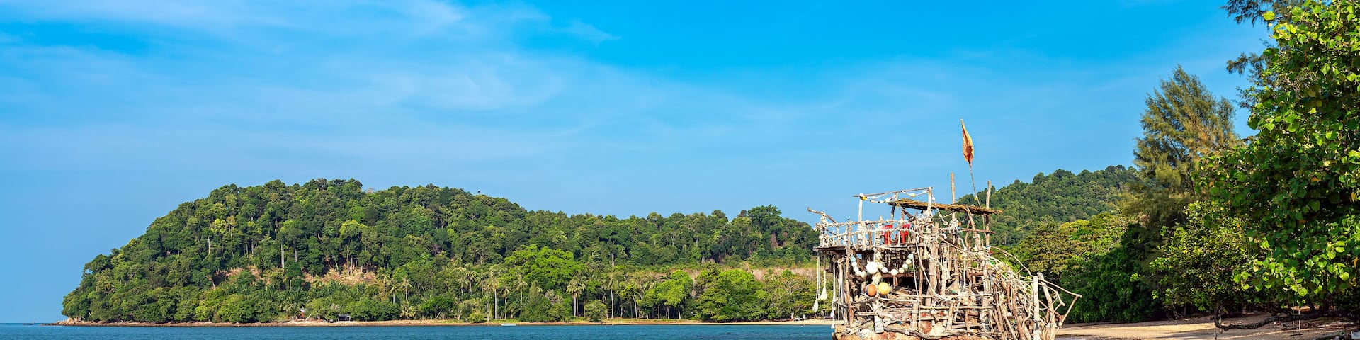 Bar and viewing platform on a rock in the sea on the beach of Hut Luboa on the island of Ko Jum. In the north of the island, which is also called Ko Pu in this part, there are quiet sandy beaches