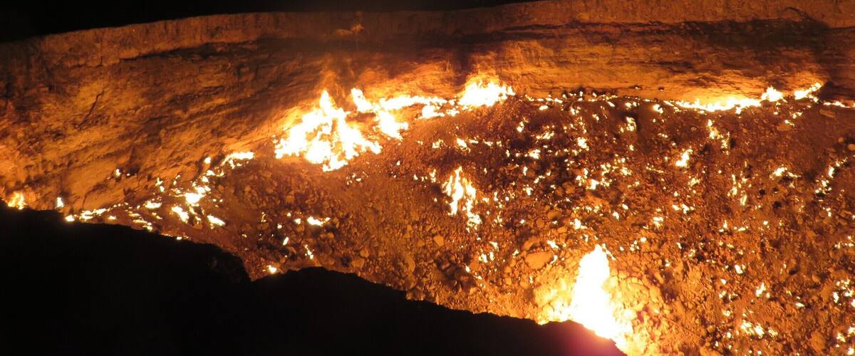 A cave with glowing lava formations.