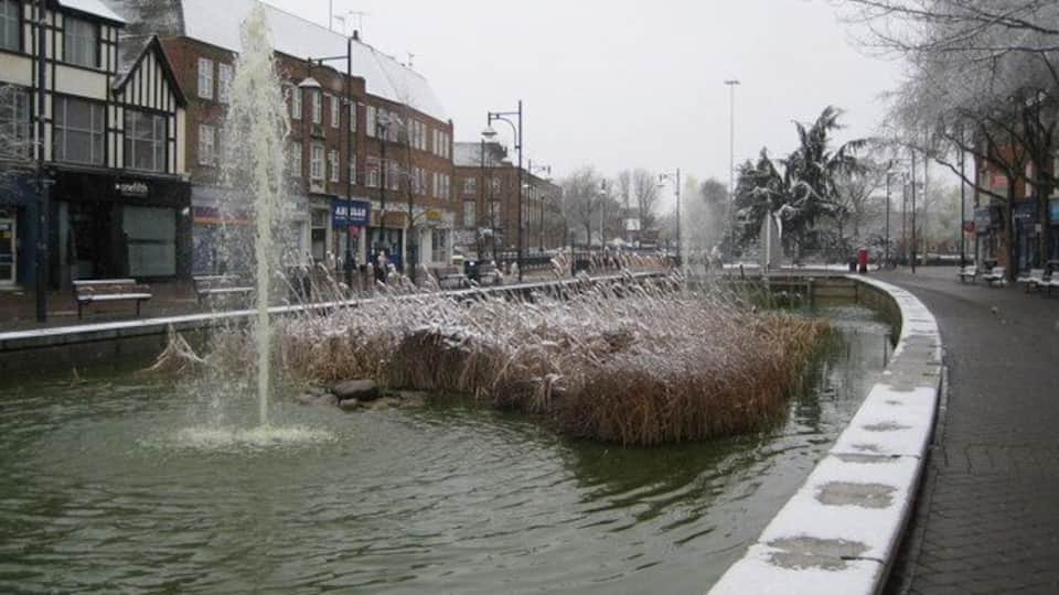 Watford: The Pond The water was a rather alarming pea-green soup colour contrasting with the whiteness of the snow on the roofs.