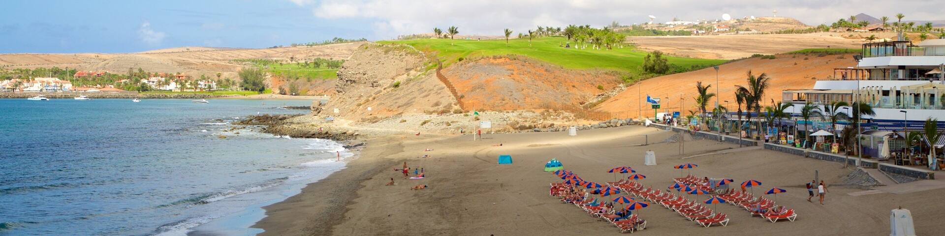 Meloneras Beach which includes general coastal views and a beach