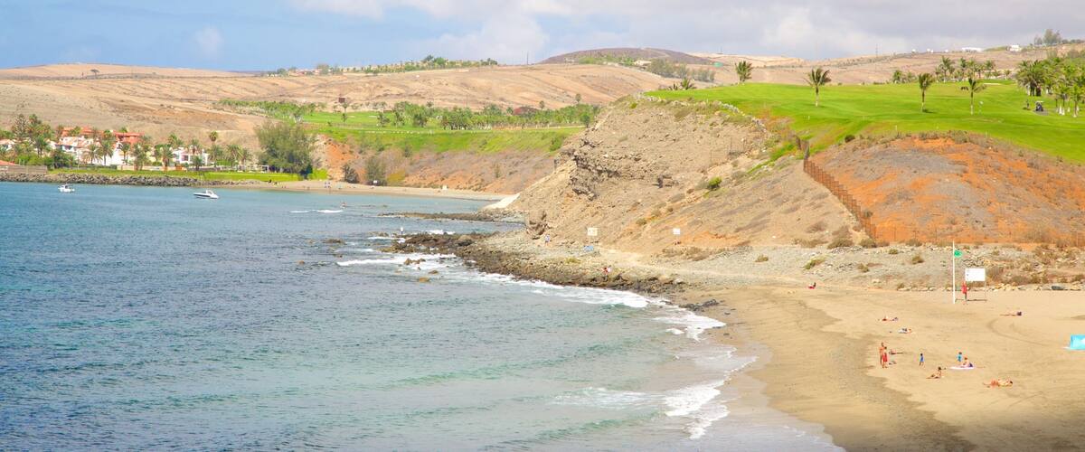 Meloneras Beach which includes a sandy beach and general coastal views