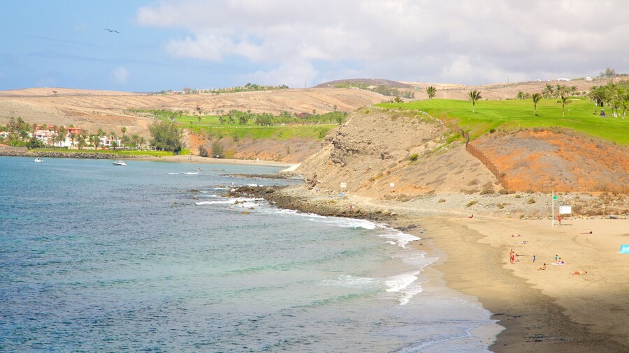 Meloneras Beach which includes a sandy beach and general coastal views