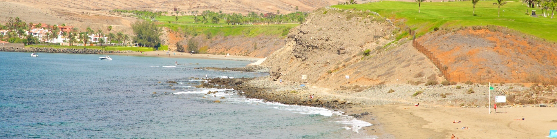 Meloneras Beach which includes a sandy beach and general coastal views