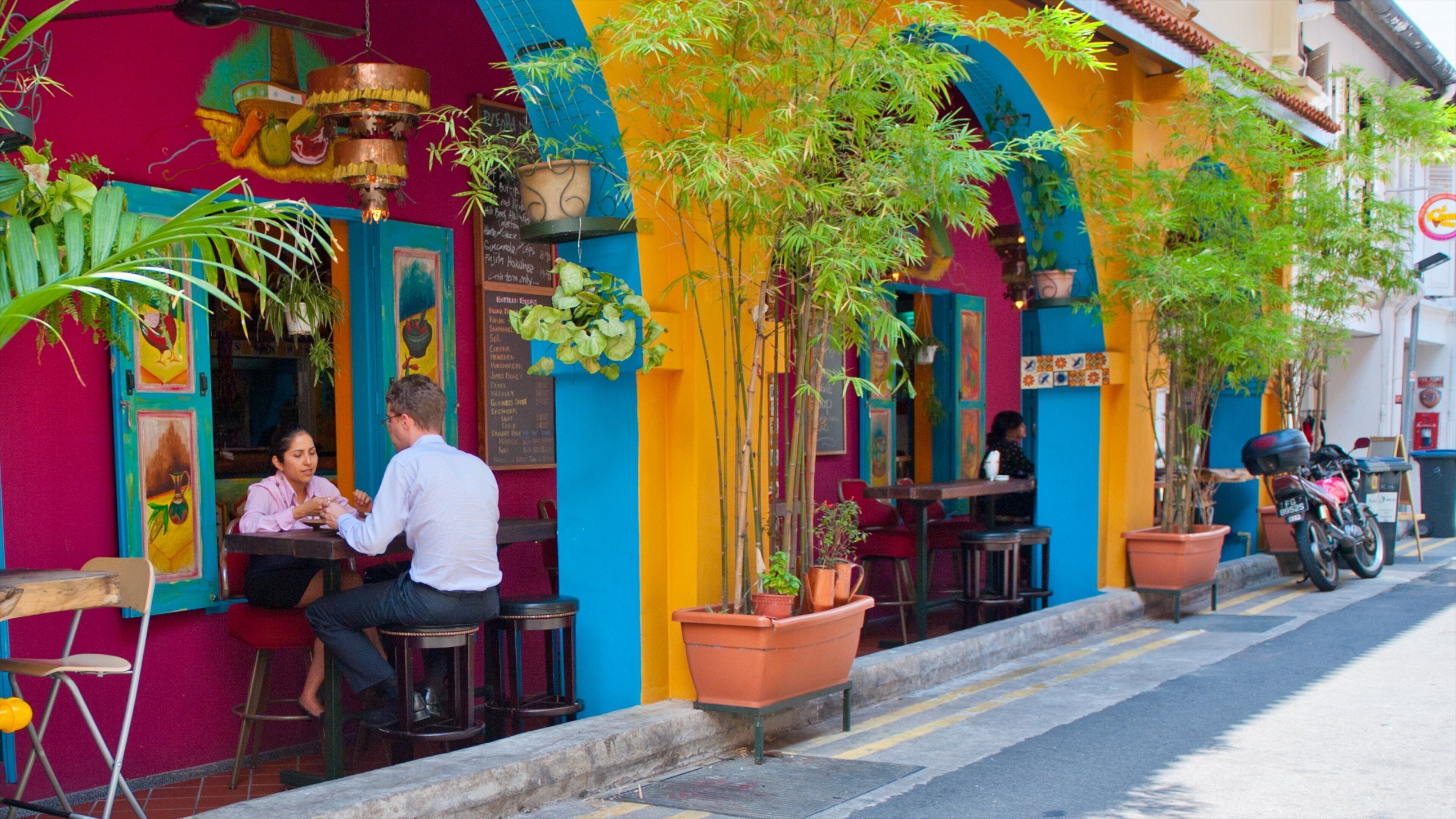 Haji Lane showing a city and street scenes as well as a couple