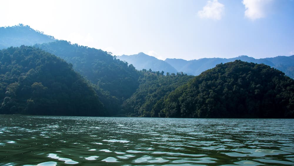 Phewa Lake and hills in Pokhara, a popular tourist destination. Taken in Nepal, Dec 2018
